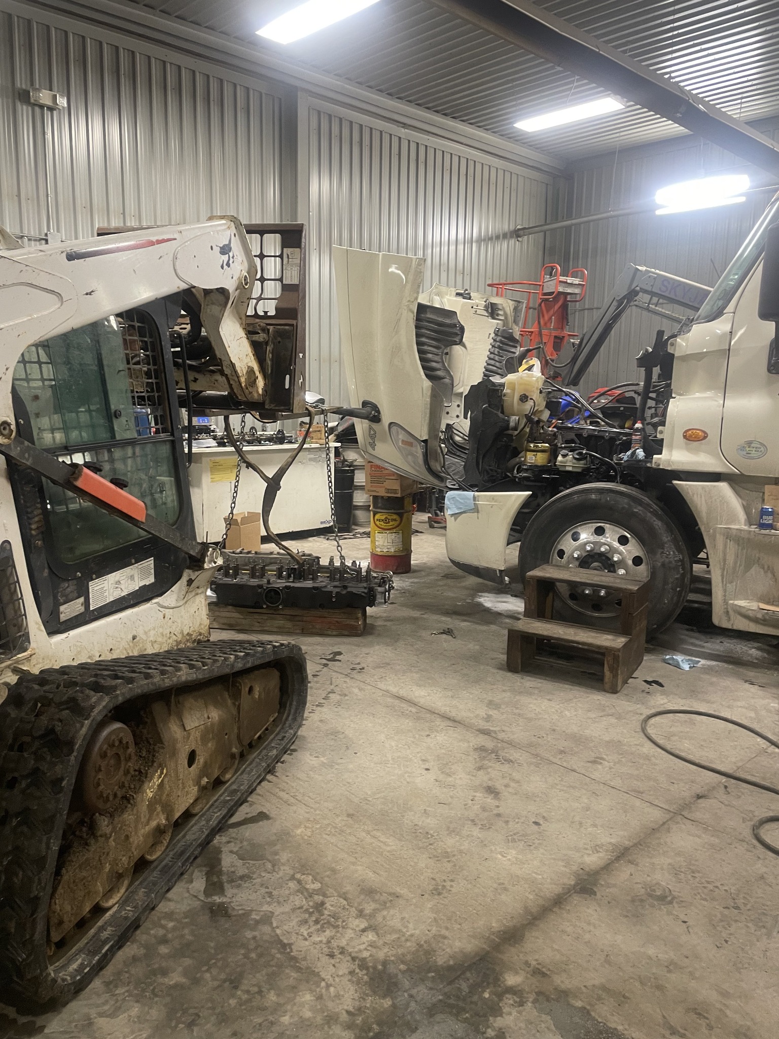 Commercial truck and equipment in service shop